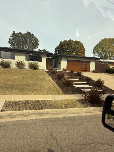 A view of a house from a car window