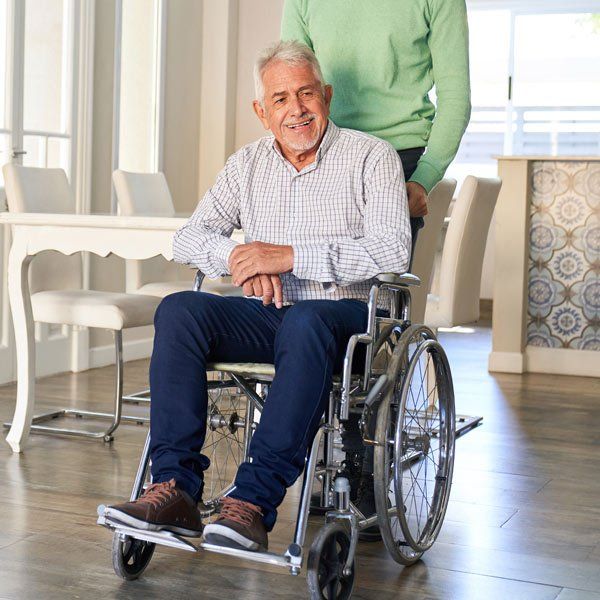 Man in wheelchair with Multiple Sclerosis