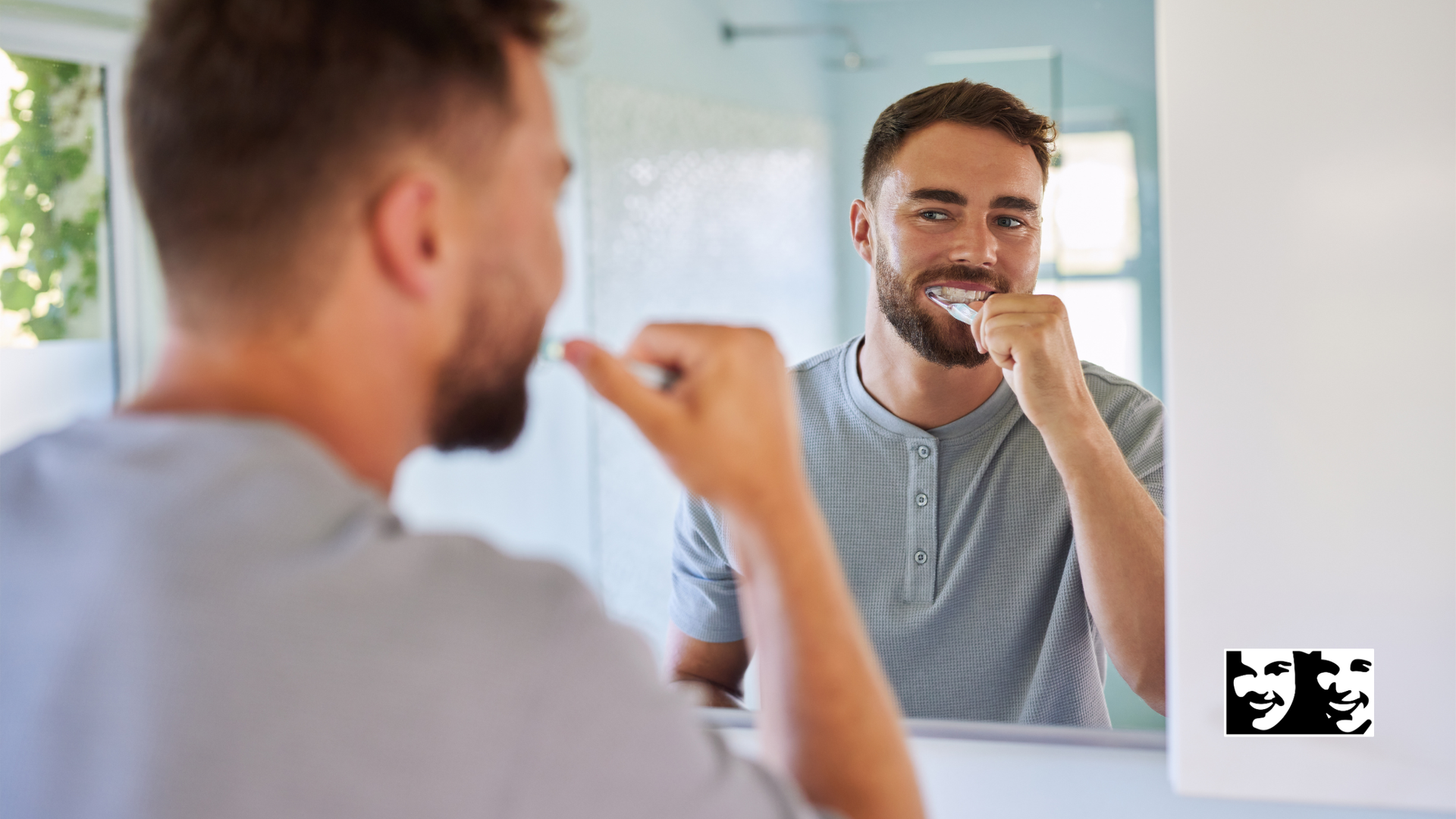 Woman brushing teeth with a green toothbrush, mouth open, white foam visible.