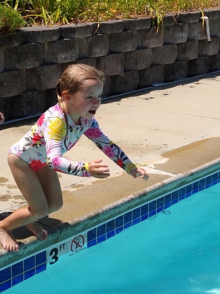 Girl Jumping on The Pool — St. Louis, MO — Sappington Child Care Center & Summer Day Camp