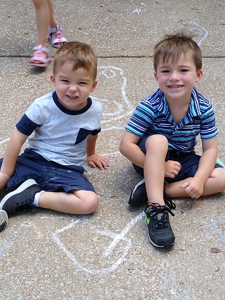 Two Boy Lying on The Floor — St. Louis, MO — Sappington Child Care Center & Summer Day Camp