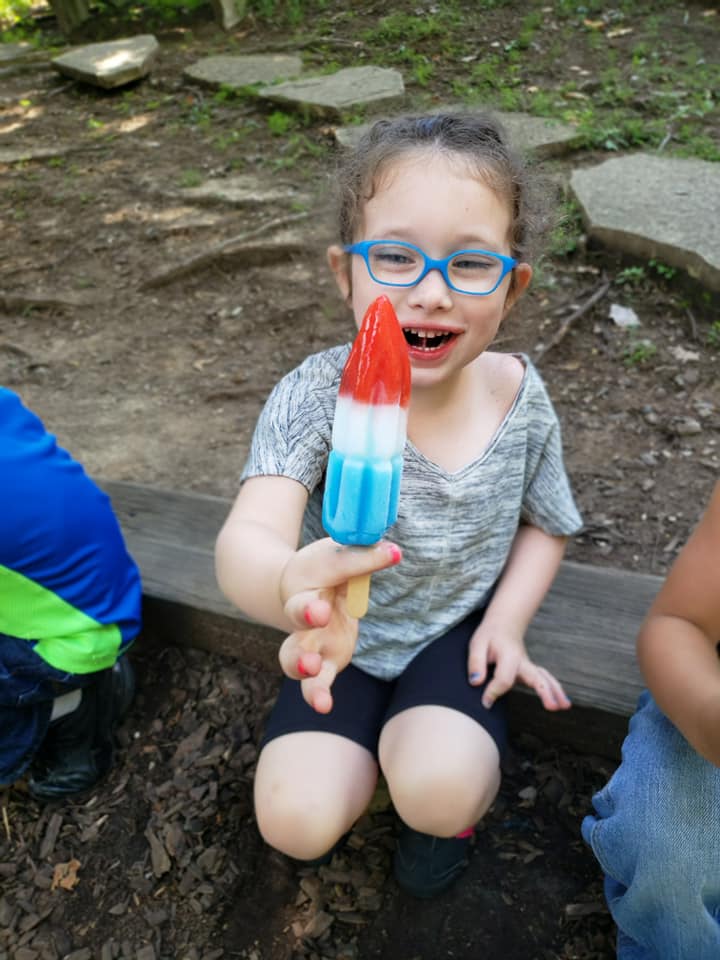 Girl Eating Ice Cream — St. Louis, MO — Sappington Child Care Center & Summer Day Camp
