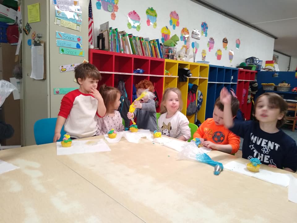 Kids Having Fun Adding an Icing on The Cupcake — St. Louis, MO — Sappington Child Care Center & Summer Day Camp