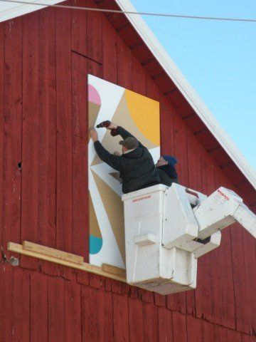 Men Working on Signage — Shawano, WI — Raddant Electric Service Inc