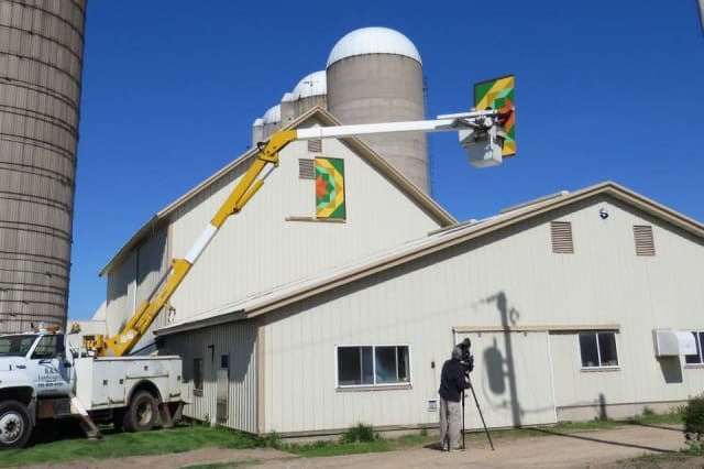 Putting Signage on Warehouse — Shawano, WI — Raddant Electric Service Inc