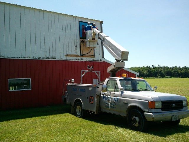 White Truck Near Barn — Shawano, WI — Raddant Electric Service Inc