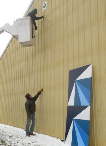 Men on Beige Wall — Shawano, WI — Raddant Electric Service Inc