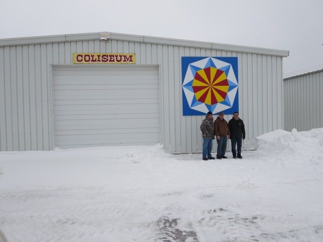 Men on Snowy Field — Shawano, WI — Raddant Electric Service Inc