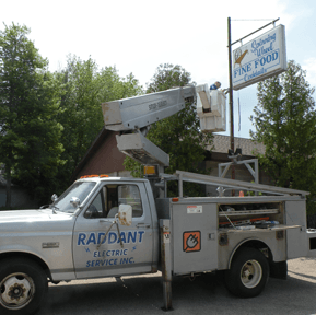 White Cherry Picker Truck — Shawano, WI — Raddant Electric Service Inc