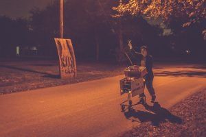 Man Walking In the Street With Shopping Cart – Dallas, TX – Artstillery