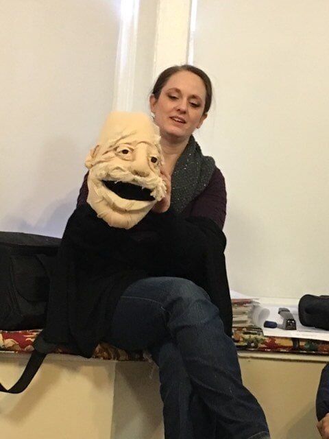 Woman Holding Face Mask – Dallas, TX – Artstillery