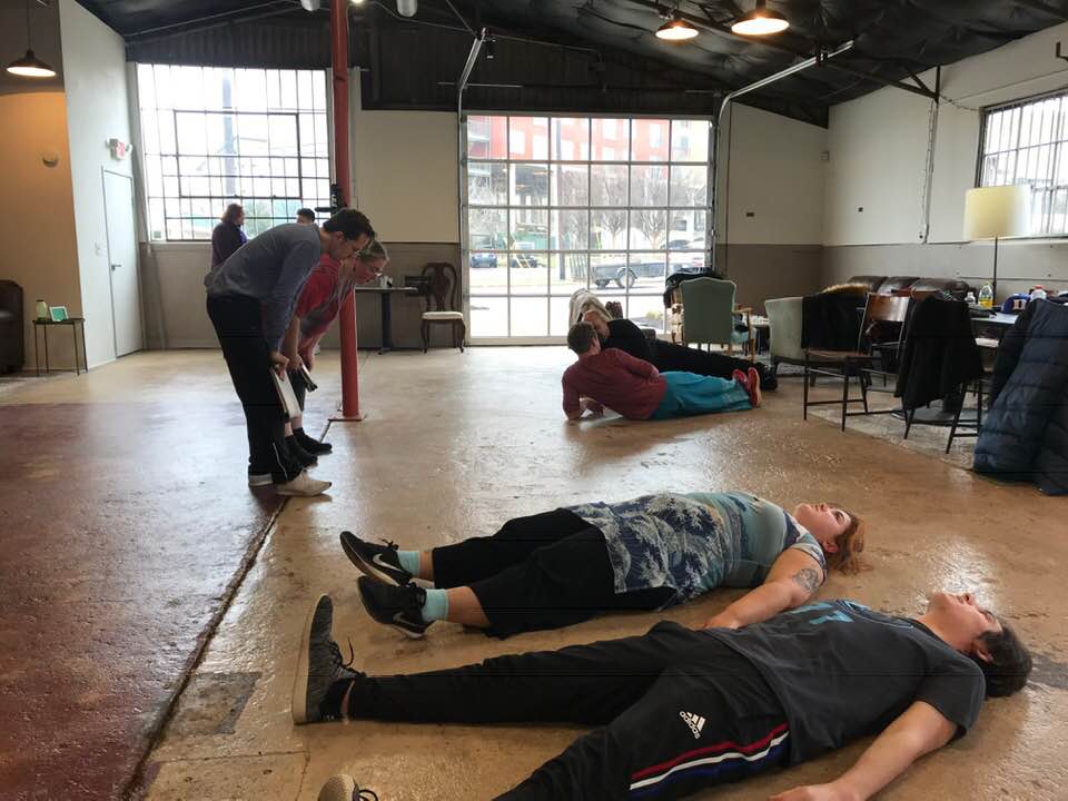 Two People Lying On The Floor – Dallas, TX – Artstillery