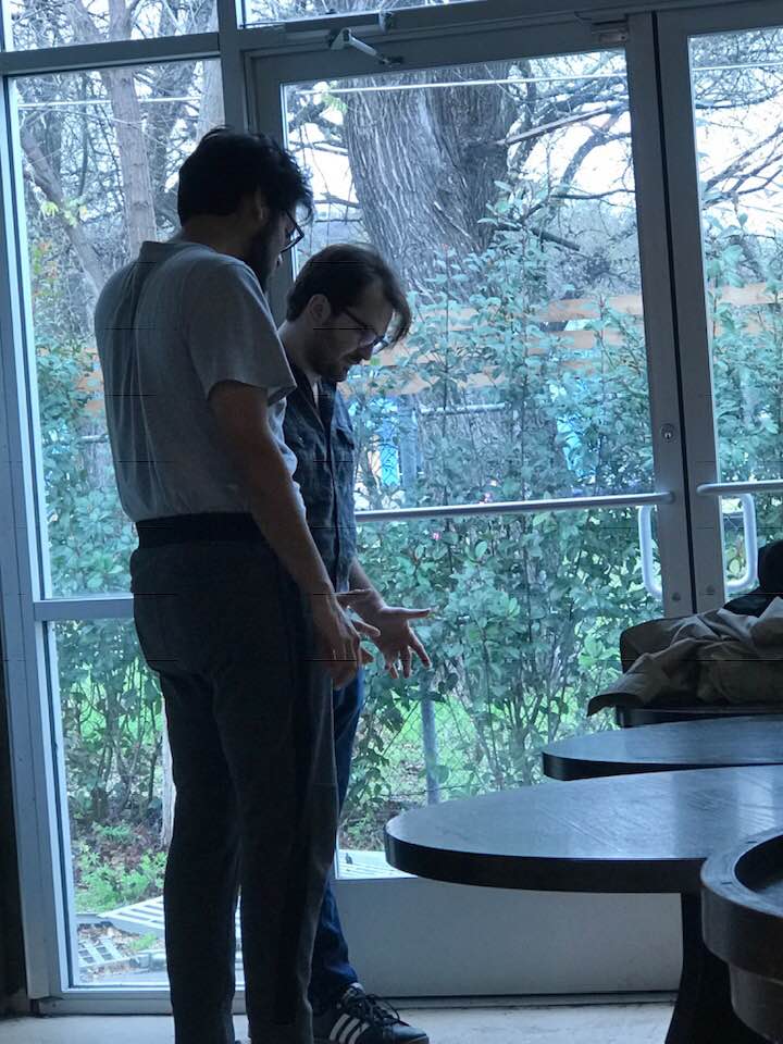 Men Standing Beside Glass Door – Dallas, TX – Artstillery