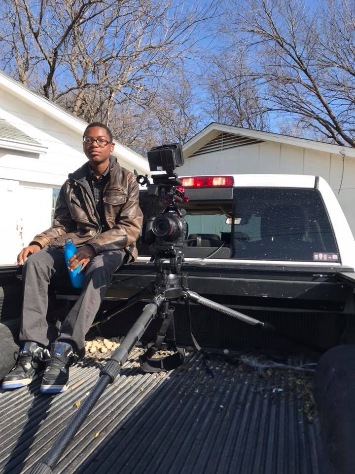 Black Man Sitting Behind The Car – Dallas, TX – Artstillery