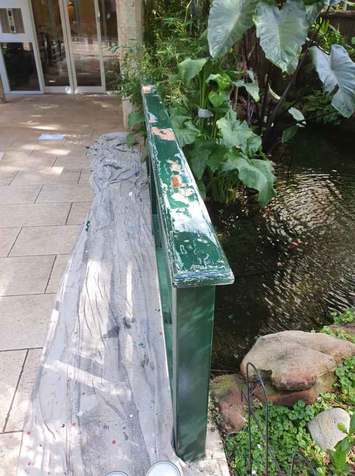 wooden railing before painting