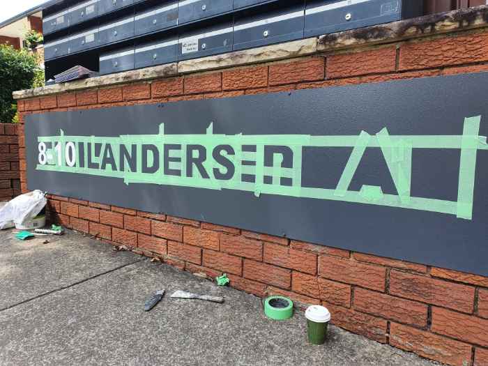 brick wall with a banner