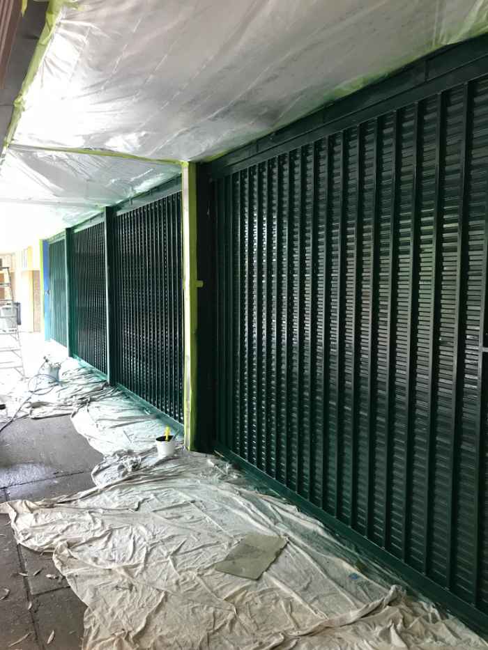 freshly painted green metal door