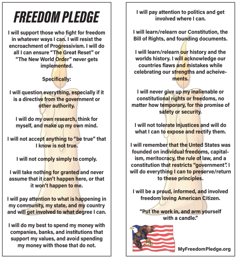 Three candles are lit in front of an american flag