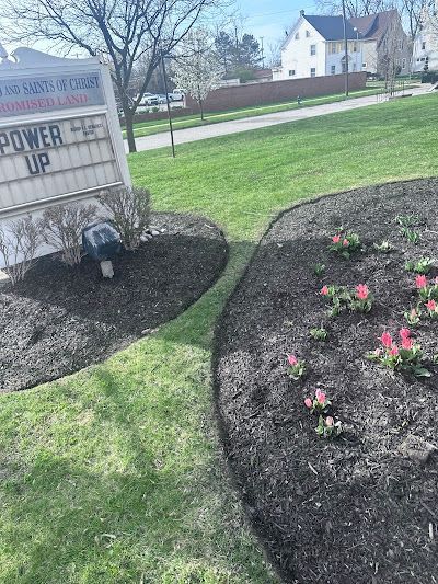 A sign that says `` power up '' is in the middle of a park.