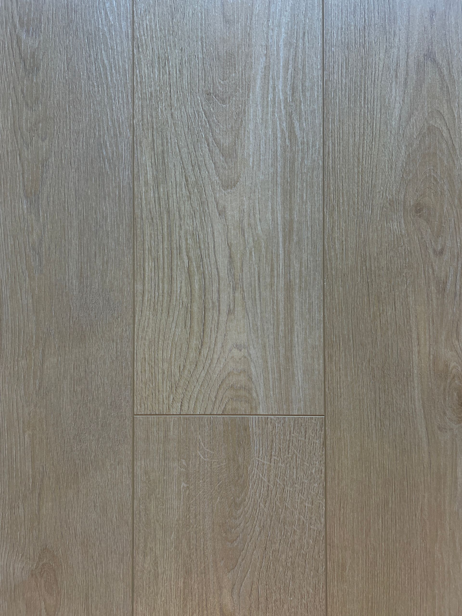 Wood-look flooring with varying shades of gray and tan, featuring a wood grain texture.