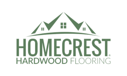 A logo for homecrest hardwood flooring with a house on top of a mountain.