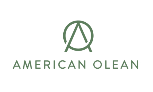 The logo for american olean is a green circle with a letter a in it.