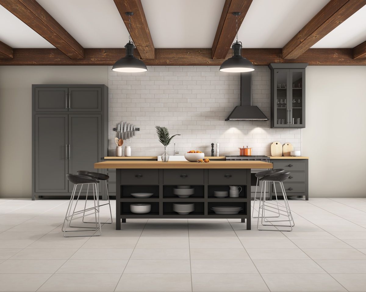 A kitchen with a large island in the middle of the room.