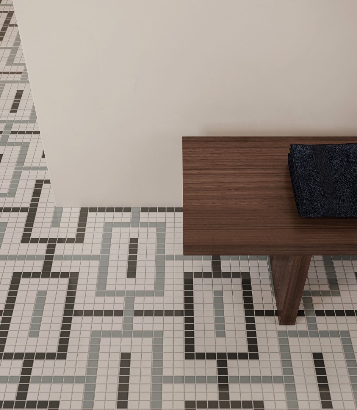 A wooden bench sits next to a black and white tiled floor