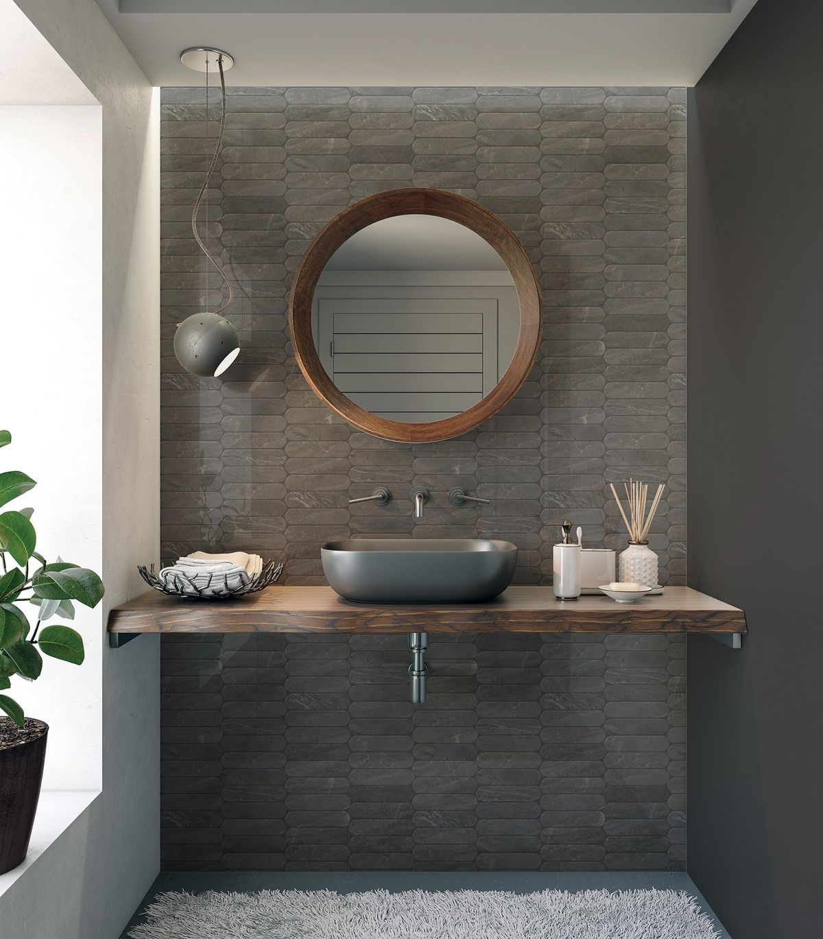 A bathroom with a sink and a mirror on the wall