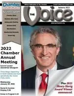 A man in a suit and tie is on the cover of a magazine.