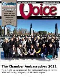 A group of people are posing for a picture on the cover of a magazine.