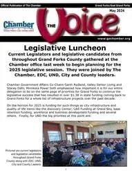 A chamber of commerce magazine with a picture of a legislative luncheon.
