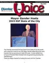 A man is standing at a podium giving a speech.