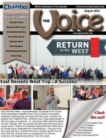 A group of people are standing next to each other on the cover of a magazine.