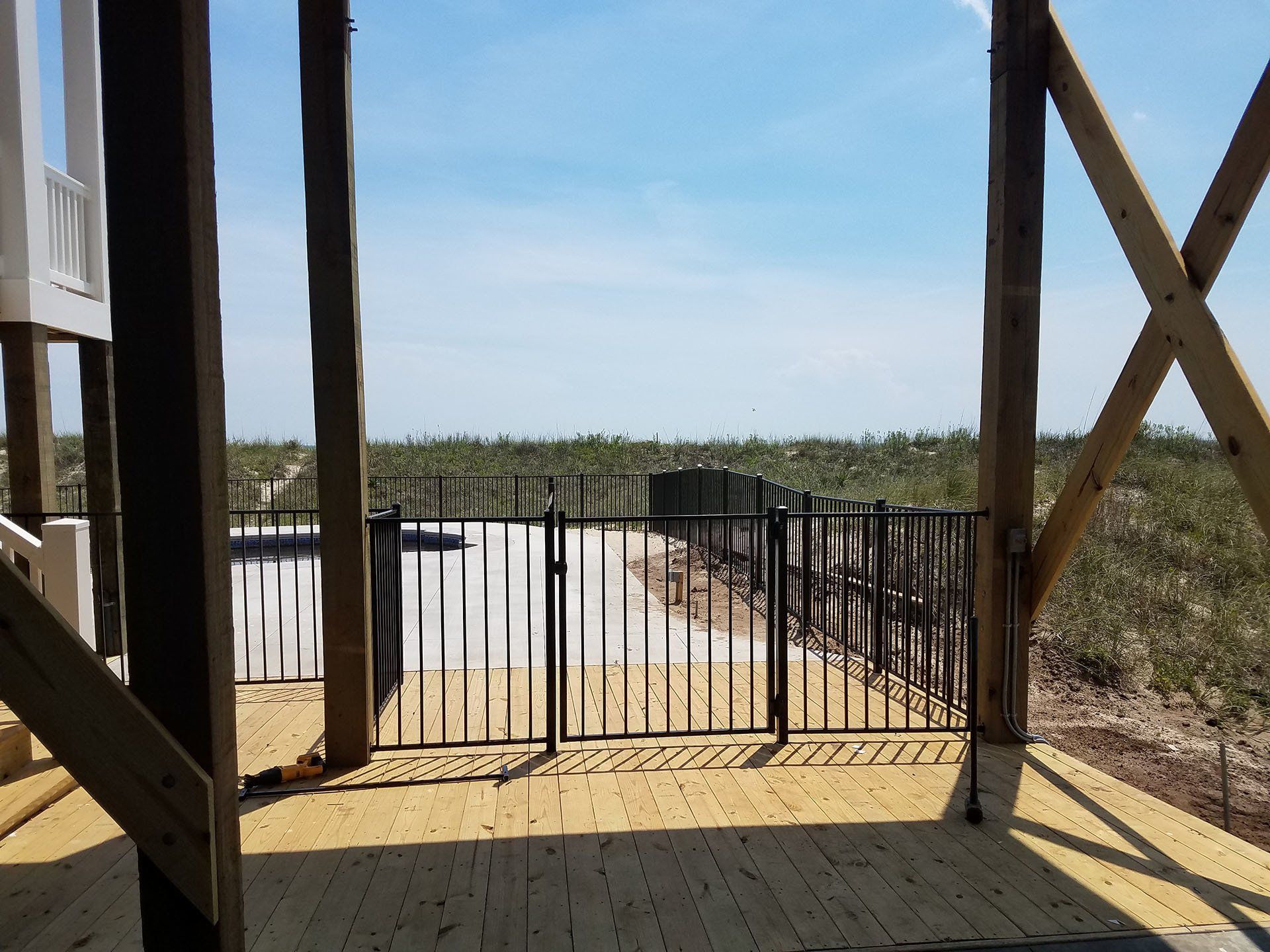 Fence Within House Deck — Wilmington,  NC — J & J Fence