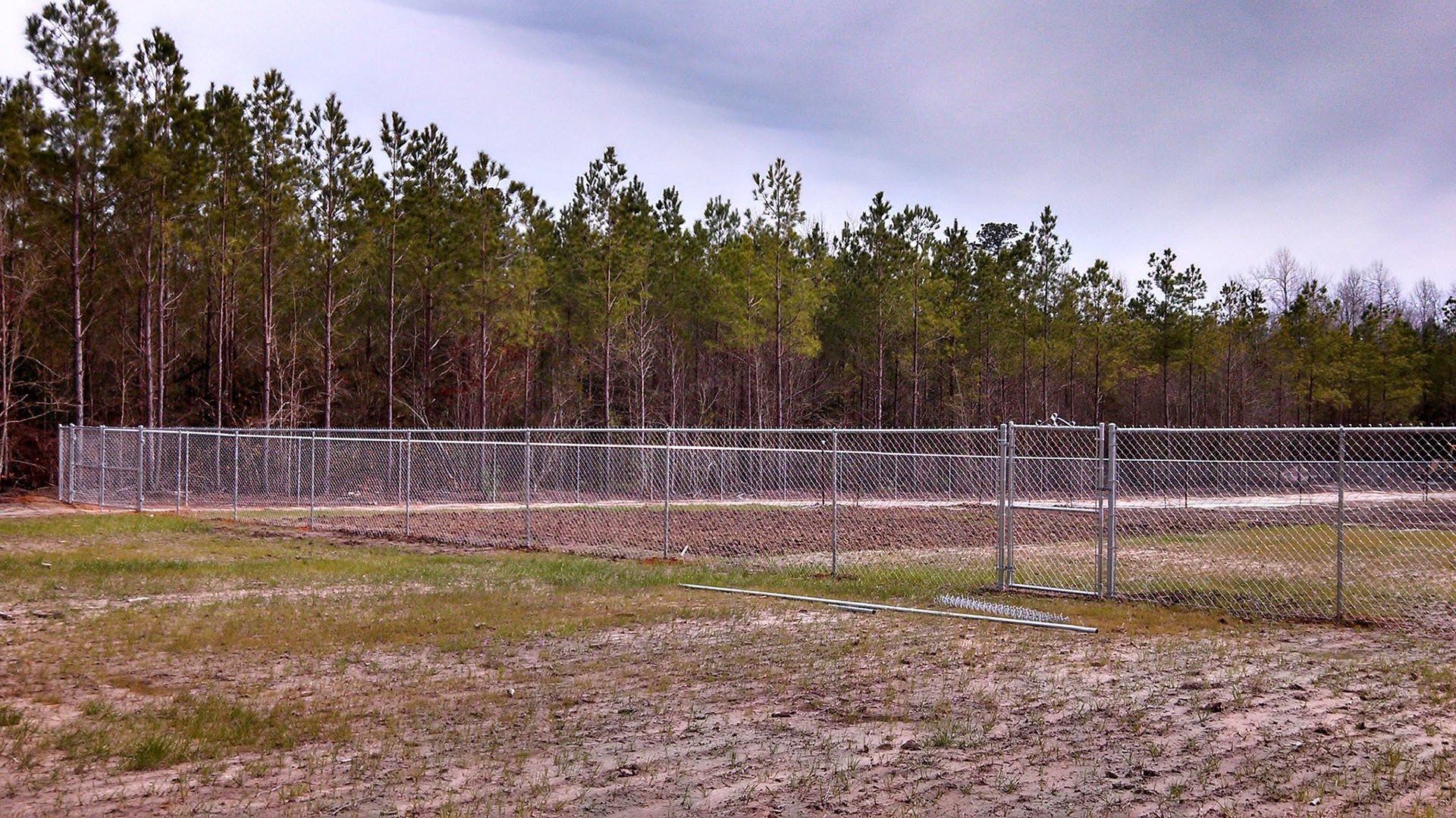 Long Fence On Field — Wilmington,  NC — J & J Fence