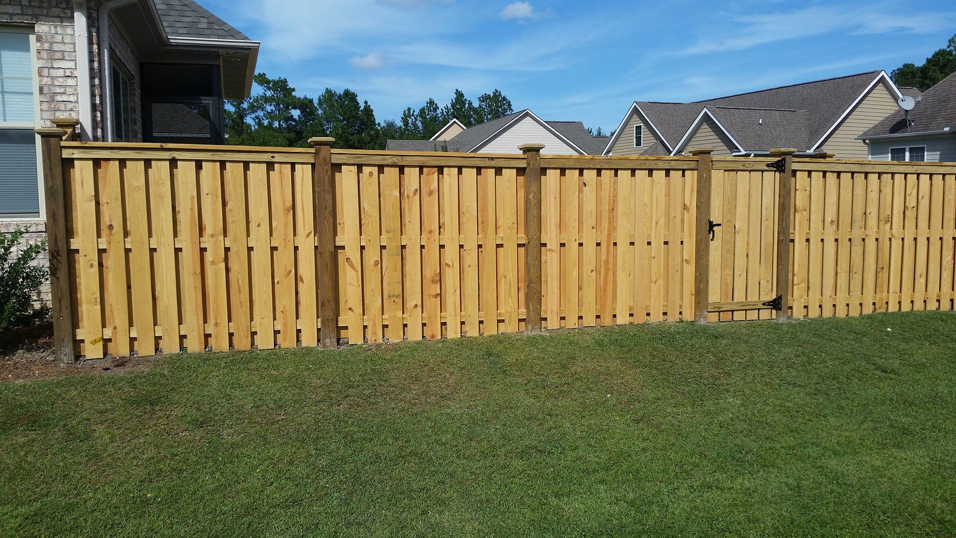 Wooden Fence With Small Gate — Wilmington,  NC — J & J Fence