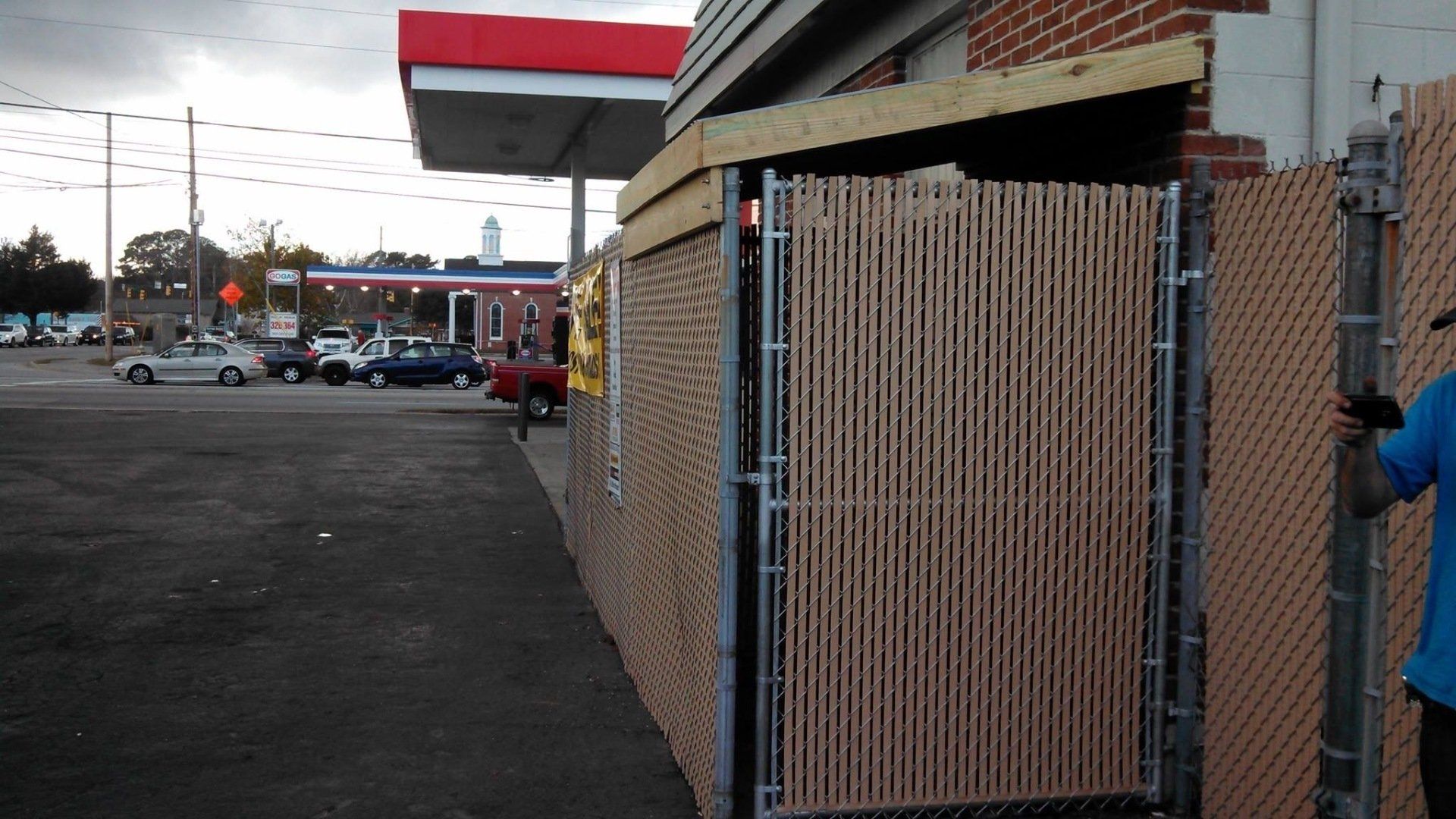 Chain Link Fence Beside Gasoline Station — Wilmington,  NC — J & J Fence