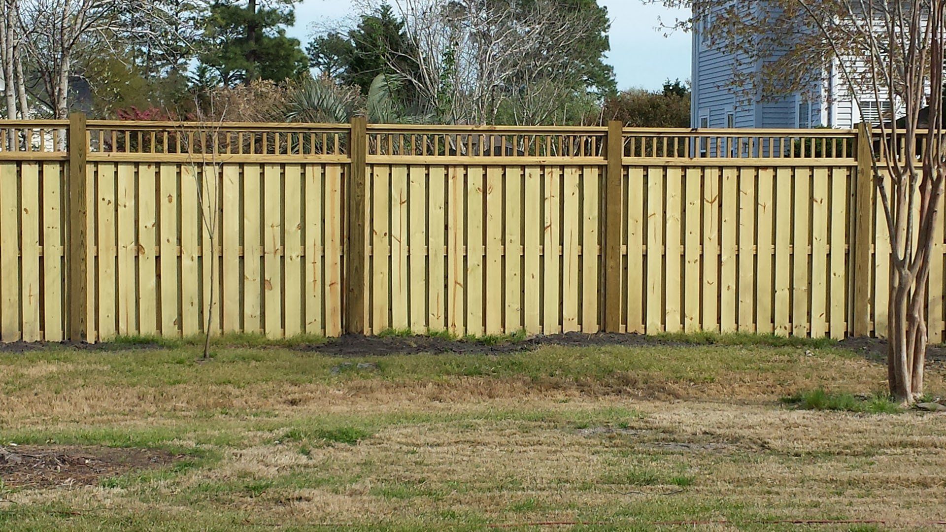 Wooden Fence With Design — Wilmington,  NC — J & J Fence