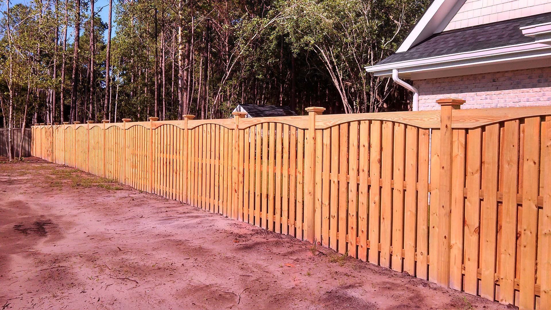 Long Wooden Fence — Wilmington,  NC — J & J Fence