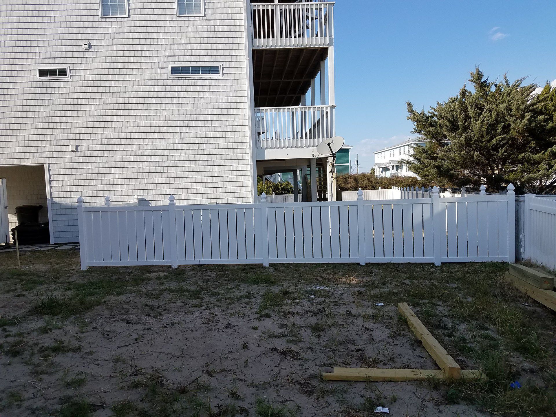 House With White Shingles Siding And Fence — Wilmington,  NC — J & J Fence