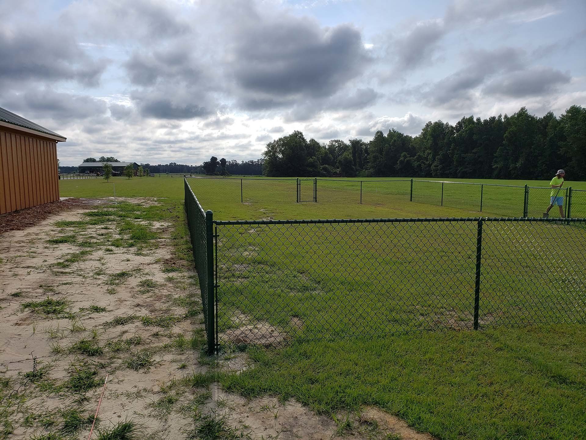 Fence On Open Field — Wilmington,  NC — J & J Fence