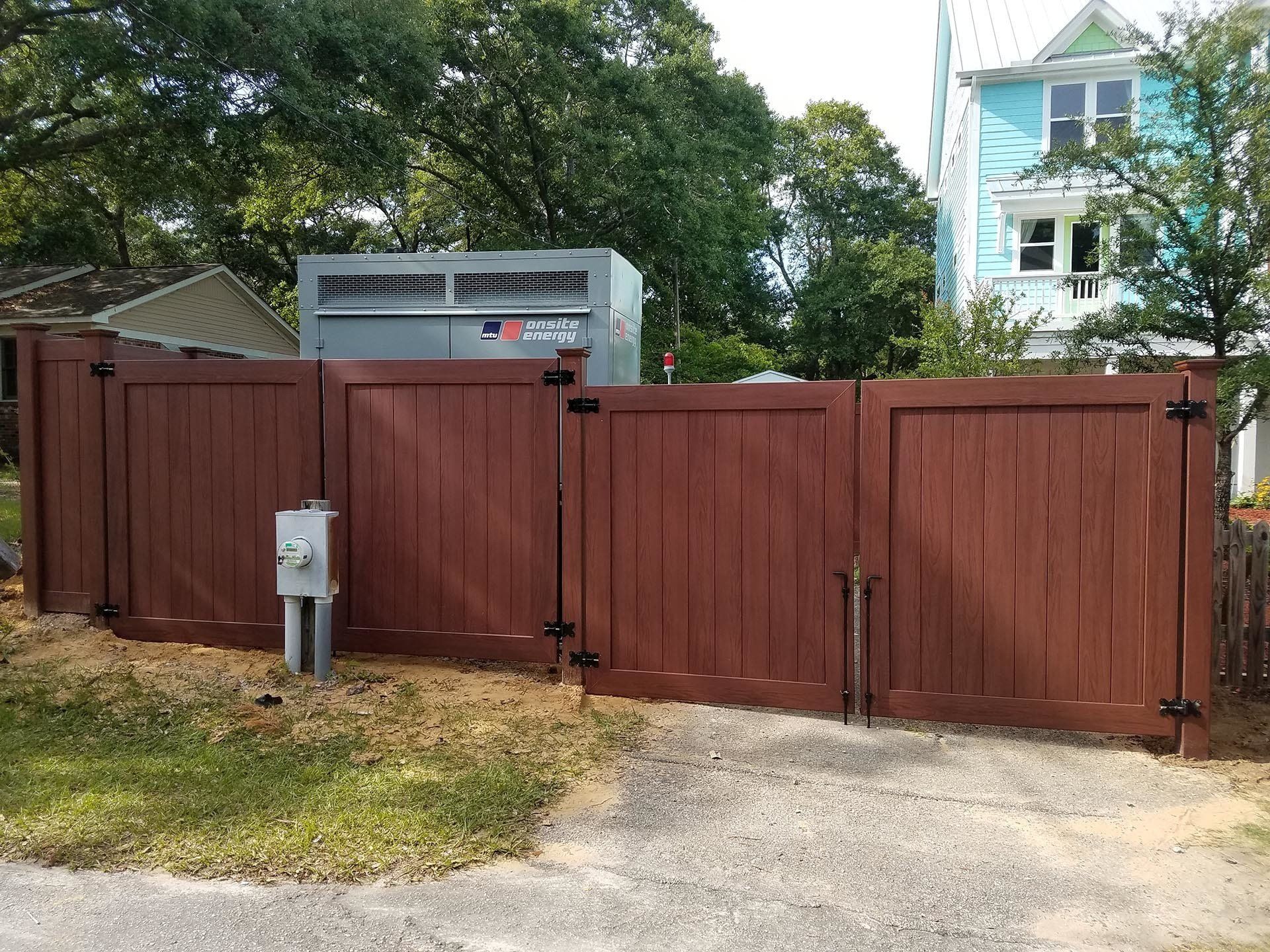 Wooden Vinyl Gate — Wilmington,  NC — J & J Fence