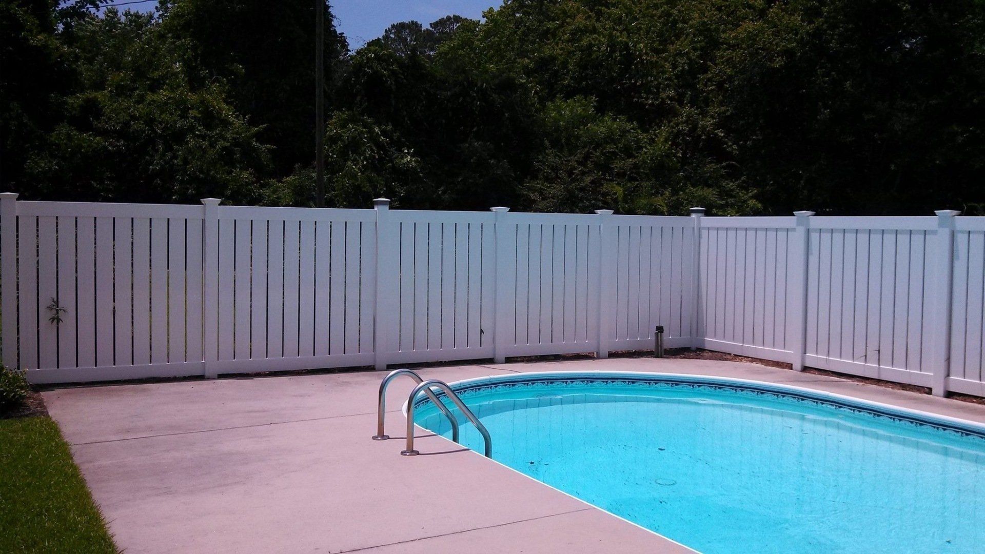 Swimming Pool With Fence — Wilmington,  NC — J & J Fence