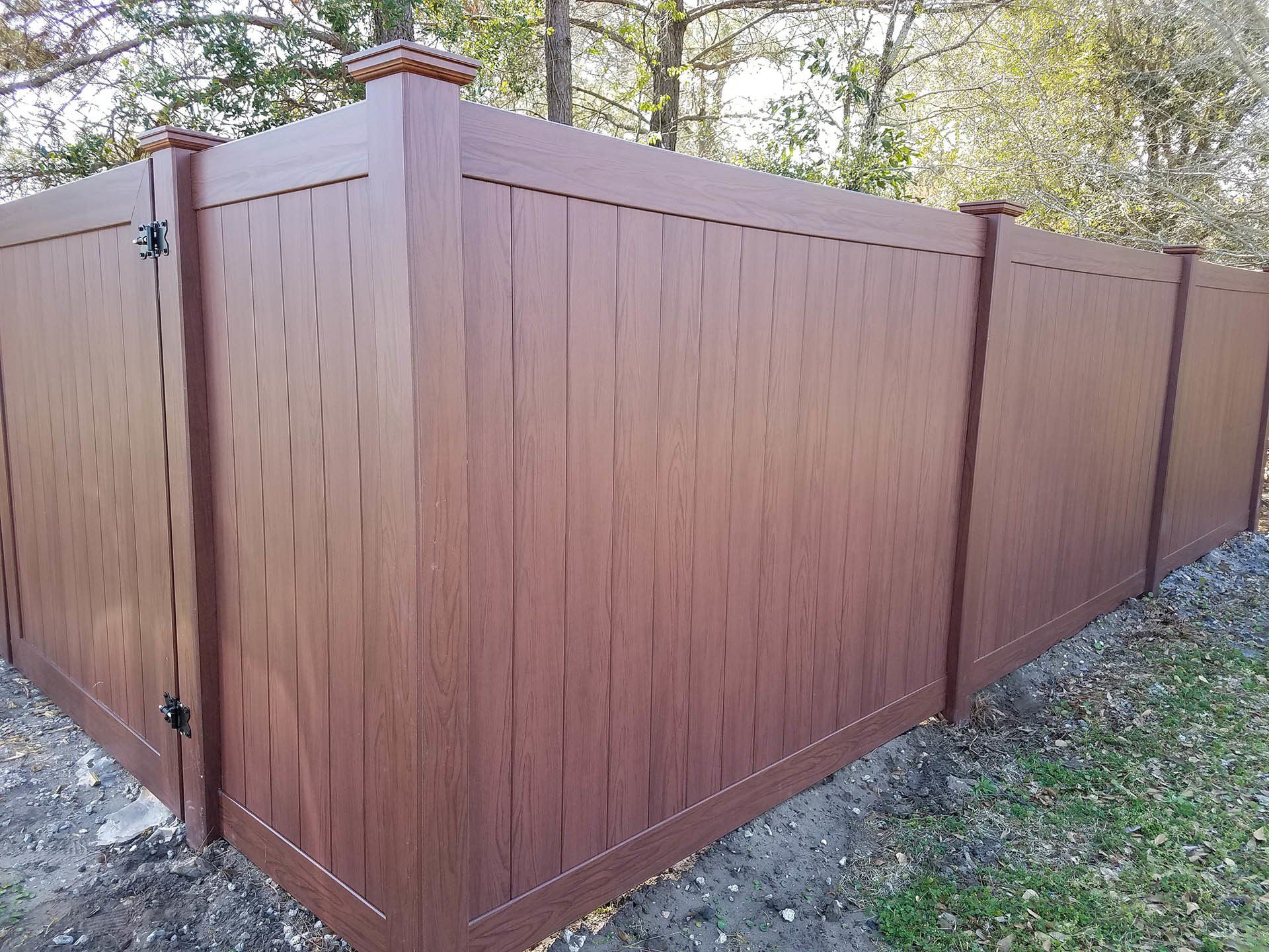 Wooden Vinyl Fence — Wilmington,  NC — J & J Fence