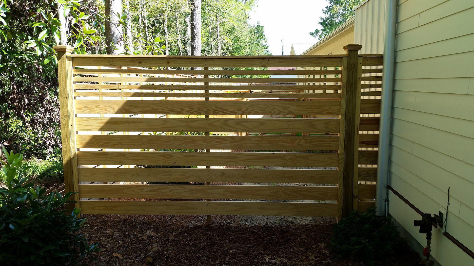 Small Wooden Fence — Wilmington,  NC — J & J Fence