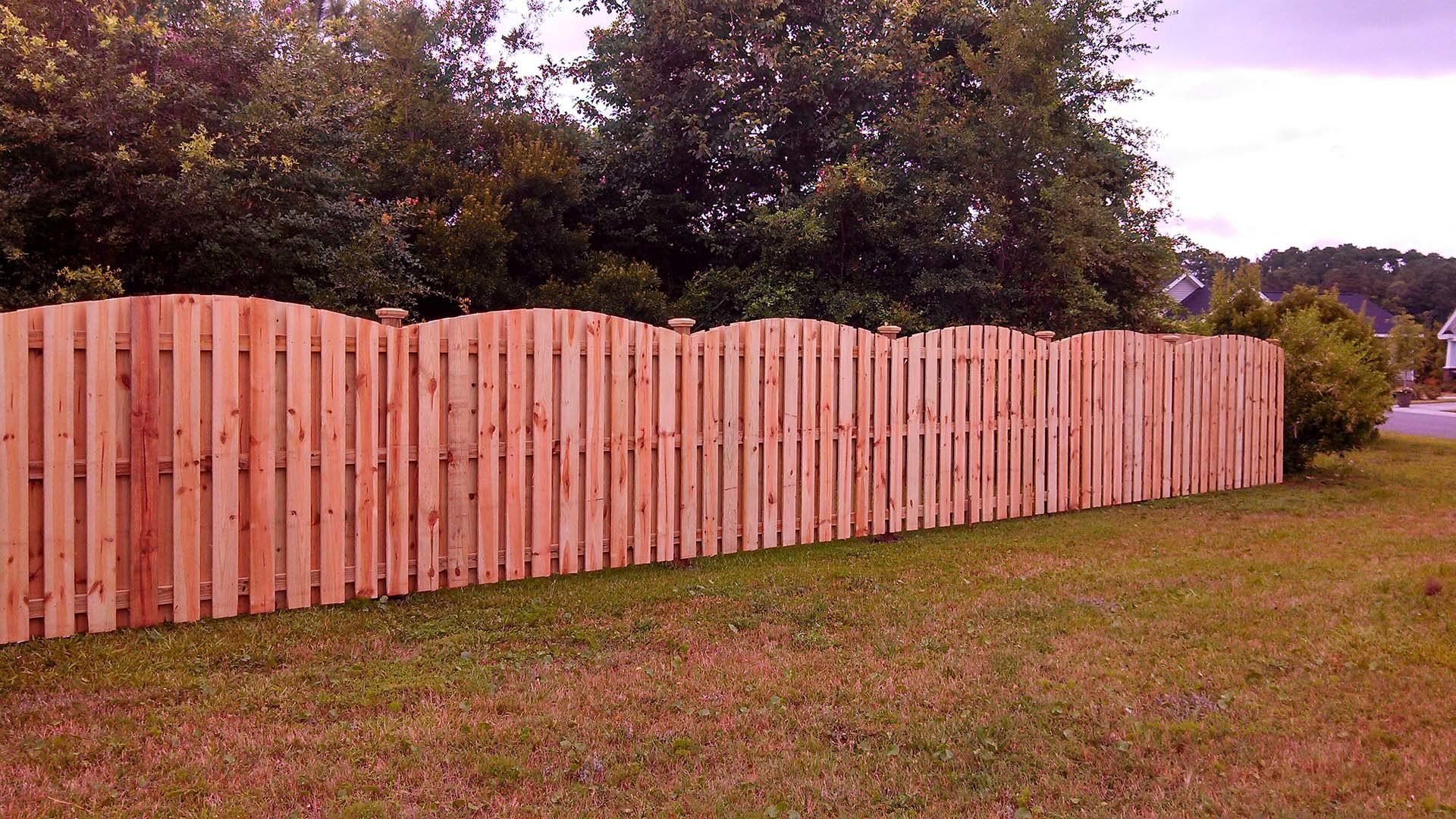 Stylish Wooden Fence — Wilmington,  NC — J & J Fence