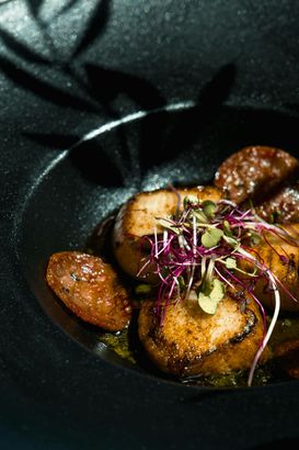 A close up of a plate of food on a table.