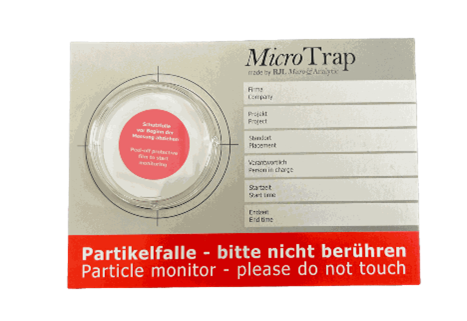 un letrero que dice monitor de partículas micro trampa por favor no tocar