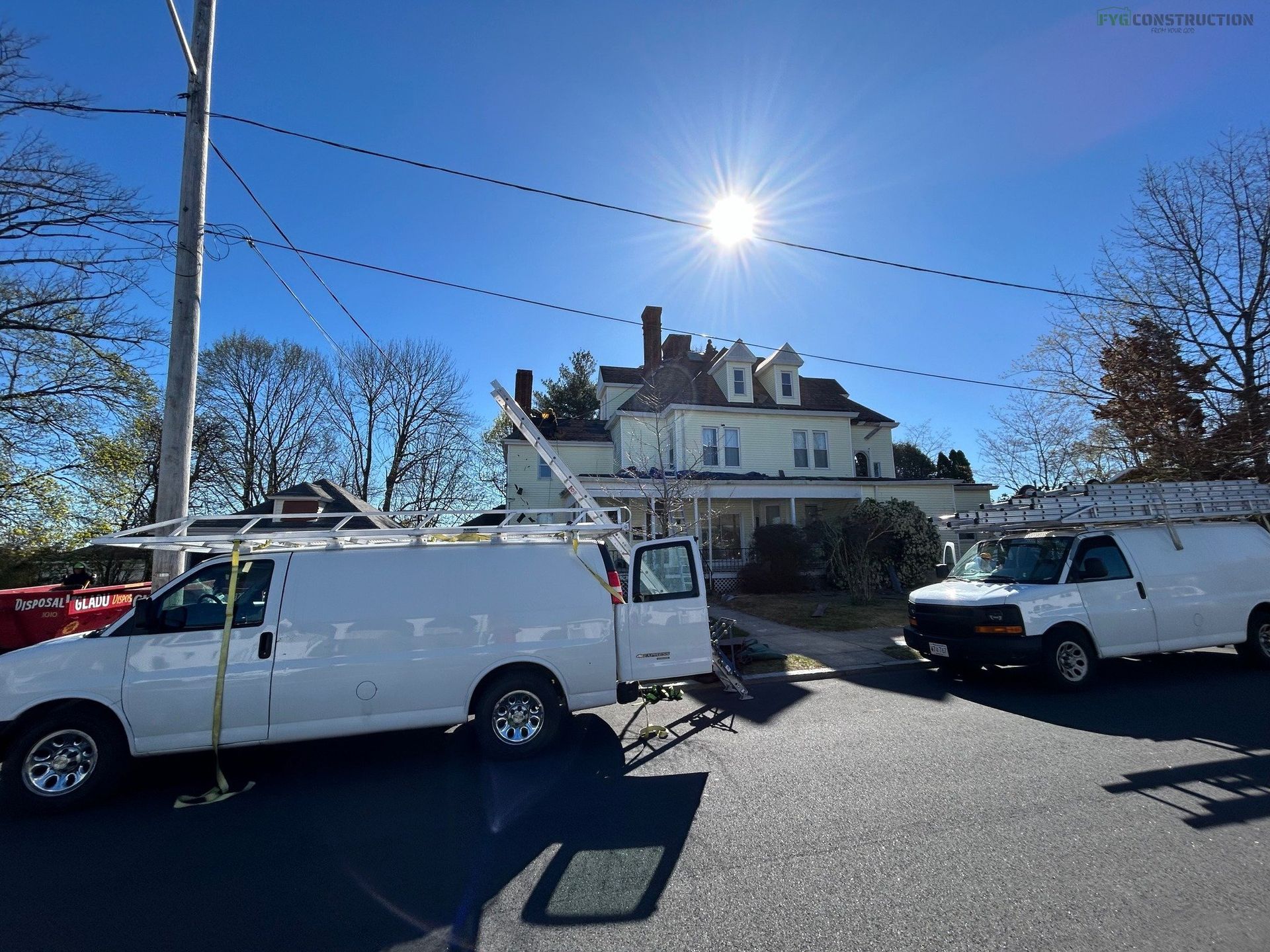 Roofing contractors on South Kingstown roof